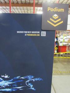 Symphony SYK-1025 Portable Display with SEG Fabric Graphics, SYM-406 Counter with Locking Storage, MOD-1376 iPad Stand, Workstation with Wireless Charging, and Large Monitor Mount