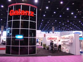 DM-0230 Island Exhibit with Product Towers and Custom Counters -- Image 1